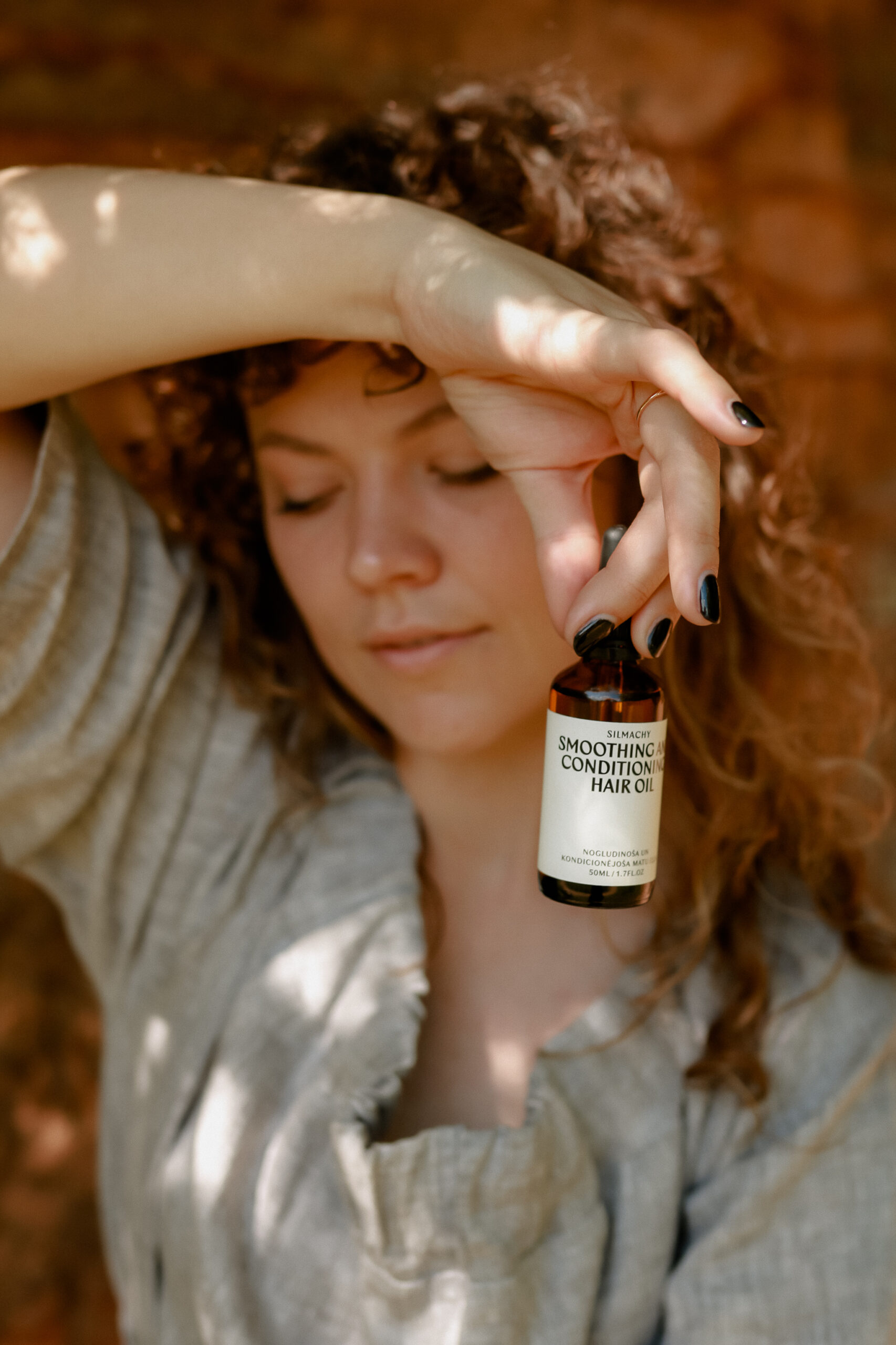 Smoothing Oil human holding